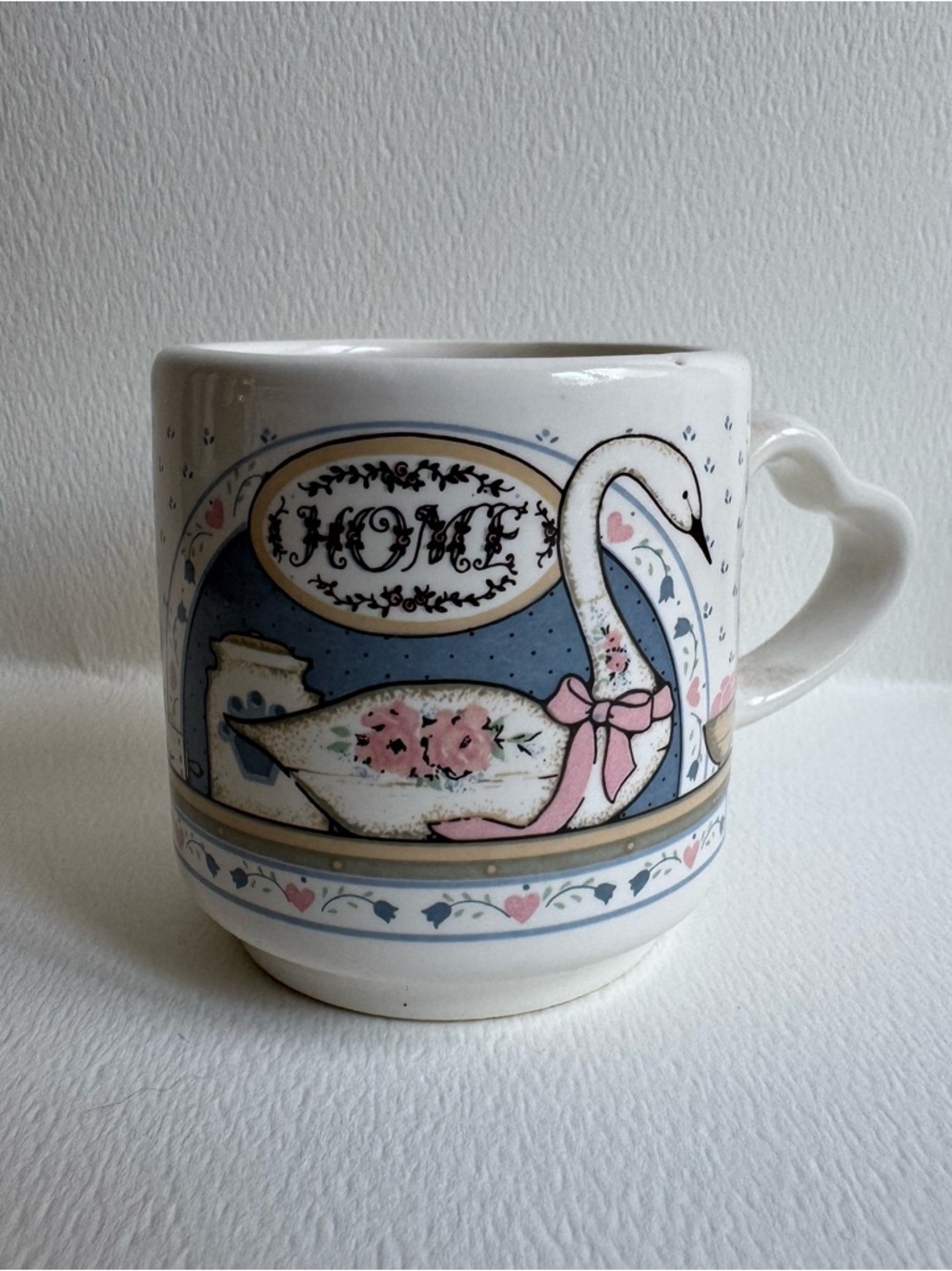 Vintage Swan Ceramic Mug in White and Pink and a heart shaped handle.